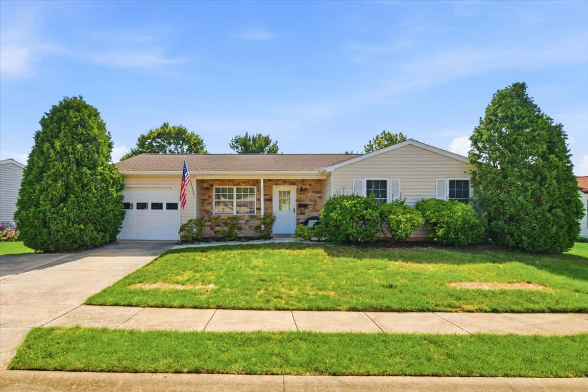 1 of 39. Well-maintained single-story home with lush landscaping and easy access to local amenities.