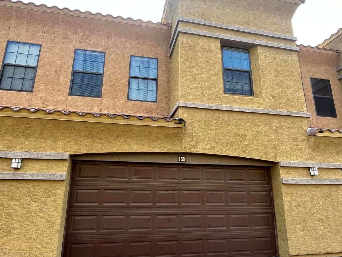 14 of 26. The attached garage offers secure two-car parking with direct access, rear vehicle entry, and additional storage, making everyday living simple and convenient.