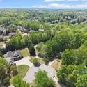 Discover a peaceful community surrounded by lush greenery and spacious lots, perfect for your dream home.