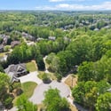 Discover a spacious home nestled in a lush, green community with stunning views and ample privacy.