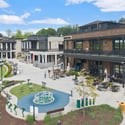 Vibrant commercial area featuring diverse dining options and community spaces, perfect for gatherings and leisure.