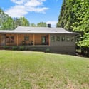 Discover this inviting home, featuring spacious grounds and a cozy porch, perfect for relaxation and gatherings.