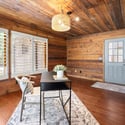 Bright and inviting office space featuring natural wood accents and ample natural light for productivity.