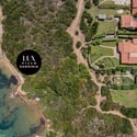 Discover coastal living at this prime Sardinian villa site, offering breathtaking sea views and lush surroundings.