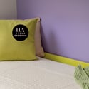 Bright and inviting bedroom with modern decor and a cozy atmosphere, perfect for relaxation.