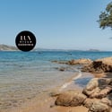 Discover breathtaking beachfront views and rugged coastline at this stunning Sardinian villa retreat.