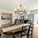Dining room with French door access to the patio, blending indoor comfort with outdoor entertaining in this Arcadia Proper home.