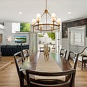 Generous dining area designed for hosting, offering open flow to living spaces and direct access to outdoor entertaining areas.