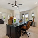 Bonus room offering flexible living options, neutral design, and ample space ideal for work-from-home or guest accommodations.