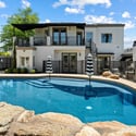 Spacious pool and deck designed for entertaining, relaxation, and enjoying the outdoor lifestyle year-round.