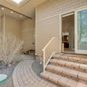 Private outdoor pet area with paved walkways, easy access, and low-maintenance landscaping designed for convenience and comfort in Flagstaff.