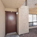 Private covered entryway offers both convenience and curb appeal while creating a comfortable transition into the home. Ground-level access adds to the property's ease of living.