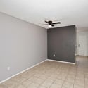 Open-concept design creates an airy atmosphere with durable tile flooring and modern paint tones. The flowing layout makes daily living and entertaining effortless.