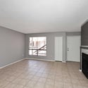 Bright living area featuring abundant natural light, low-maintenance flooring, and a spacious layout. An inviting space designed for comfort and functionality.