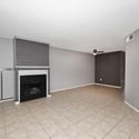 Open living and dining space with a stylish fireplace and excellent flow between rooms. Perfect for entertaining while maintaining a comfortable everyday living environment.