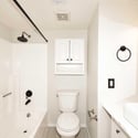Updated bathroom featuring a modern vanity, stylish vessel sink, and refreshed finishes throughout. Thoughtful upgrades provide both functionality and visual appeal.