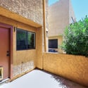Attractive patio area featuring privacy, mature greenery, and convenient access to indoor living areas. A wonderful extension of the home's usable living space.