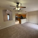 Expansive great room connected to the kitchen for easy entertaining and everyday functionality. Bright windows and an open layout maximize space and comfort.
