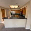 Well-equipped kitchen with stainless steel appliances, abundant cabinet storage, and an efficient layout. Perfect for cooking, organization, and daily convenience.