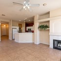 Spacious interior showcasing an open floor plan with tile flooring, recessed lighting, and excellent flow between living areas. Designed for both entertaining and everyday convenience.