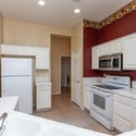 Spacious kitchen featuring extensive cabinet storage, generous counter space, and recessed lighting. A practical layout designed to support daily living while maintaining an open and airy feel.