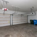Large three-car garage with abundant storage potential and space for vehicles, tools, and outdoor equipment. A sought-after feature that enhances everyday functionality.