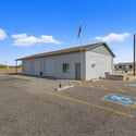 Exceptional detached workshop offering oversized bay doors, extensive paved parking, covered workspace, and professional-grade features including 220V power and a dedicated electric meter. Perfect for collectors, contractors, or entrepreneurs.