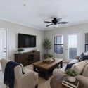 Virtually staged to showcase the possibilities, this bright living room features abundant natural light, neutral d cor, and private balcony access, creating an inviting space for relaxing or entertaining.