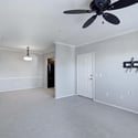 The spacious great room offers endless possibilities for furniture placement while connecting naturally with the dining area and kitchen, creating an ideal layout for modern living.