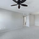 A second perspective highlights the generous dimensions of the great room and its easy flow throughout the home. Neutral finishes provide a move-in-ready canvas for any decorating style.