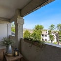 Virtually staged to illustrate its possibilities, this covered balcony offers a comfortable outdoor retreat with peaceful views of the surrounding Scottsdale community and nearby mountains.