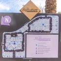 The community directory showcases the property's thoughtfully designed layout and highlights desirable amenities including swimming pools, fitness center, putting green, spa, and clubhouse facilities.