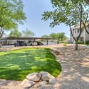Residents can enjoy a dedicated putting green surrounded by professionally maintained landscaping, providing a fun recreational amenity within this desirable Scottsdale community.