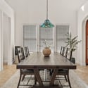 Filled with natural light, this inviting breakfast area offers the perfect place for everyday meals while overlooking the beautifully designed interior spaces of this Scottsdale home.