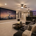 The professionally finished basement provides exceptional flexibility with a spacious recreation room, home theater potential, full bar, surround sound, and ample space for entertaining guests.