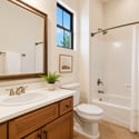 Tastefully staged to highlight its bright, welcoming atmosphere, this bathroom offers a spacious vanity, full tub and shower, quality fixtures, and timeless finishes throughout.