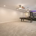 This versatile finished basement offers generous open living space ideal for a home theater, fitness area, game room, or additional family room with premium finishes throughout.