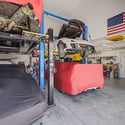 Designed for automotive enthusiasts, this oversized garage features lift-ready ceilings, extensive workspace, and ample room for vehicles, tools, and projects while providing incredible storage flexibility.