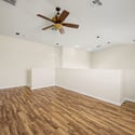 Bright and spacious, this versatile loft offers updated flooring, recessed lighting, and flexible open space perfect for entertaining, working from home, or creating a private retreat.