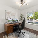A private enclosed office on the main level creates the ideal work-from-home setup.