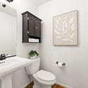 A half bathroom is located on the main level, perfect for guests.