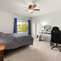 Bedroom 2 on the upper level (includes walk-in closet)