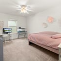 Bedroom 3 on the upper level (includes walk-in closet)