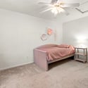 Bedroom 3 on the upper level (includes walk-in closet)