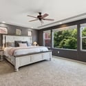 A large primary suite is positioned privately on the back of the home.