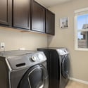 Laundry room is conveniently located upstairs near all of the bedrooms (washer & dryer included)