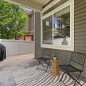 A cozy covered patio calls for summer barbecues and hanging out with friends!