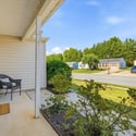 Discover a welcoming entryway that opens to a vibrant neighborhood with scenic views and convenience.