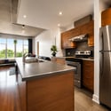 Modern kitchen with sleek cabinetry, stainless steel appliances, and an open layout inviting natural light.