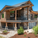 Discover this Mountain Modern Steamboat home featuring a blend of wood and stone, mountain views, extraordinary space, and multiple outdoor living areas.